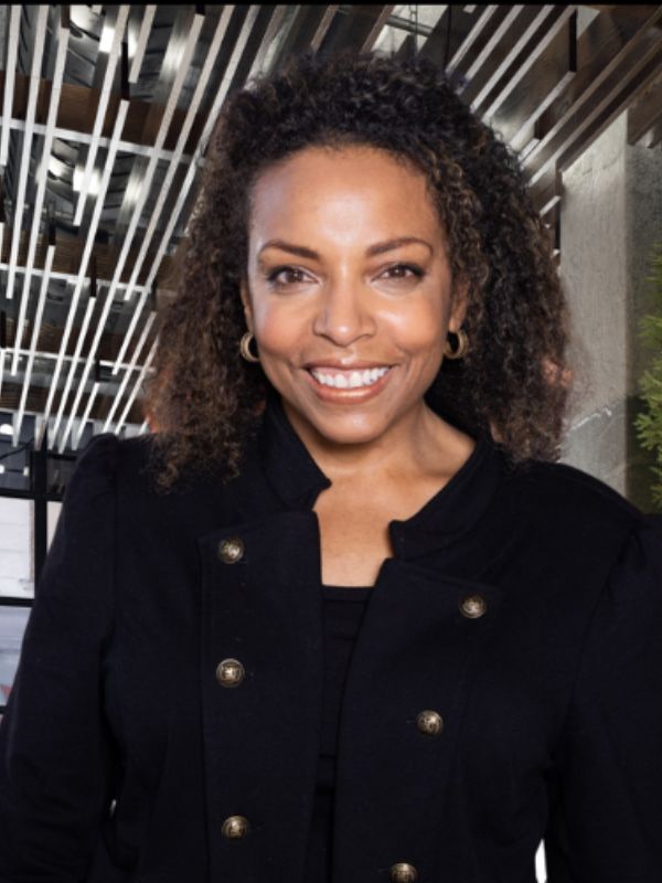 Cynthia Overton, PhD, Executive Director of the Center for Person-Centered Care, smiling and wearing a black jacket.